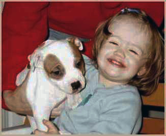 Photo of Helen with puppy